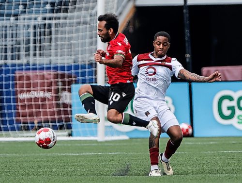 JOHN WOODS / FREE PRESS
Valour FC Dante Campbell (6) defends against Calvary FC Sergio Camargo (10) in Winnipeg Sunday, July 7, 2024. 

Reporter: ?