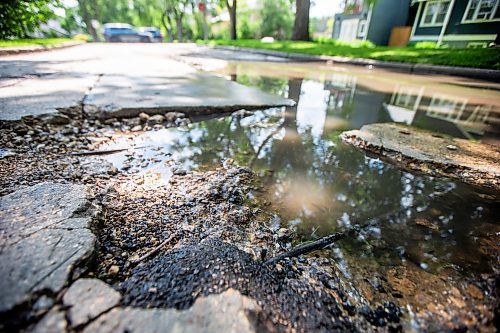 MIKAELA MACKENZIE / FREE PRESS

A pothole, deep enough to expose the rebar beneath, on Campbell Street between Academy Road and Wellington Crescent on Monday, July 8, 2024. 

For Joyanne story.

