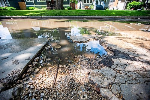 MIKAELA MACKENZIE / FREE PRESS

A pothole, deep enough to expose the rebar beneath, on Campbell Street between Academy Road and Wellington Crescent on Monday, July 8, 2024. 

For Joyanne story.

