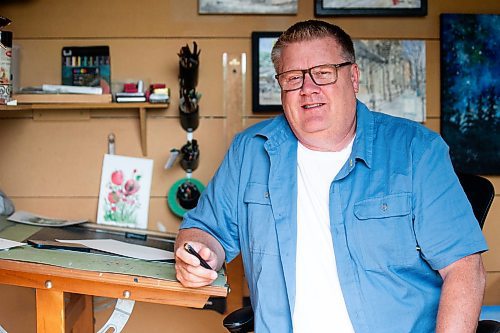 MIKAELA MACKENZIE / FREE PRESS

Artist (and art teacher by day) Tim Toews in his backyard studio on Monday, July 8, 2024. His ink and wash paintings of the Winnipeg are tiny masterpieces, crammed full of detail in a tight 8x8 space.

For AV story.

