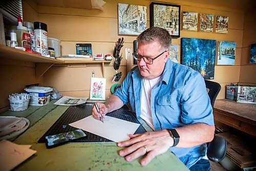 MIKAELA MACKENZIE / FREE PRESS

Artist (and art teacher by day) Tim Toews draws in his backyard studio on Monday, July 8, 2024. His ink and wash paintings of the Winnipeg are tiny masterpieces, crammed full of detail in a tight 8x8 space.

For AV story.

