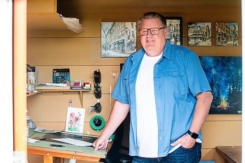 MIKAELA MACKENZIE / FREE PRESS

Artist (and art teacher by day) Tim Toews in his backyard studio on Monday, July 8, 2024. His ink and wash paintings of the Winnipeg are tiny masterpieces, crammed full of detail in a tight 8x8 space.

For AV story.

