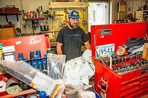 NIC ADAM / FREE PRESS
St. Andrews Airport is celebrating its 60th anniversary this month since it first opened.
St. Andrews Airport Maintenance Driver/Operator, Austin Leclaire, working in the airport&#x2019;s maintenance garage on Monday morning.
240708 - Monday, July 08, 2024.

Reporter: Matt Frank