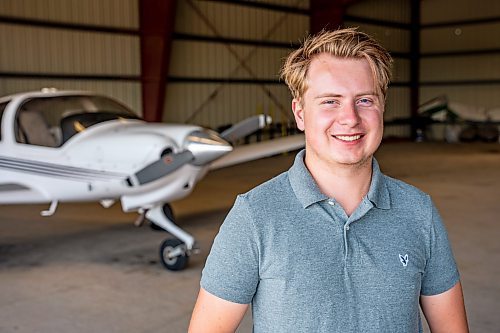 NIC ADAM / FREE PRESS
St. Andrews Airport is celebrating its 60th anniversary this month since it first opened.
Harv&#x2019;s student and employee, Will Duffin, poses in front of a plane at St. Andrews Airport on Monday morning.
240708 - Monday, July 08, 2024.

Reporter: Matt Frank