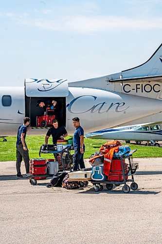 NIC ADAM / FREE PRESS
St. Andrews Airport is celebrating its 60th anniversary this month since it first opened.
A SkyCare Air Ambulance restocks after landing at St. Andrews Airport on Monday morning.
240708 - Monday, July 08, 2024.

Reporter: Matt Frank