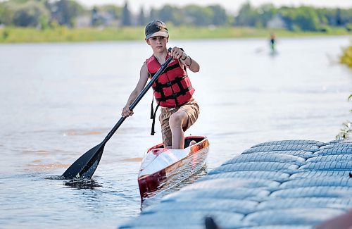 \Ruth Bonneville / Free Press

Standup -  Canoe and Kayak Club 

MB. Canoe and Kayak Club student, Logan Wintoniw (10yrs), finishes up a 2-hour, morning, training session. on the Red River Tuesday.  

Logan compete in the high-kneeling canoe category, and is part of a larger group of kids that train 7x per week at the club during the summer months located on the banks of the Red River on Churchill Drive.

July 9th,  2024

