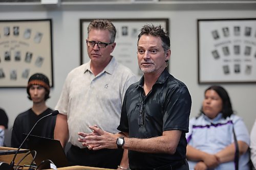 General manager of corporate services Cory Schermann explains the potential financial impacts of water affordability programs as general manager of development services Mark Allard looks on at Monday's Brandon City Council meeting. (Colin Slark/The Brandon Sun)