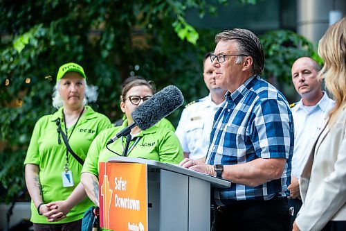 MIKAELA MACKENZIE / FREE PRESS

Downtown Community Safety Partnership executive director Greg Burnett and other stakeholders make an announcement on improving downtown safety at a press conference at True North Square on Tuesday, July 9, 2024. 

For Chris story.

