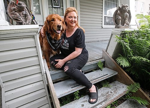 JOHN WOODS / FREE PRESS
Theresa Thomson, a performer and director,  and her dog Ragnar Lothpup. are photographed at her home in Winnipeg Tuesday, July 9, 2024. Thomson has billeted Fringe performers for the past 20 years, including Paco Erhard.

Reporter: ben