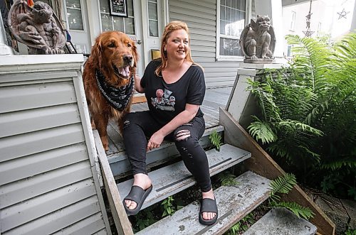 JOHN WOODS / FREE PRESS
Theresa Thomson, a performer and director,  and her dog Ragnar Lothpup. are photographed at her home in Winnipeg Tuesday, July 9, 2024. Thomson has billeted Fringe performers for the past 20 years, including Paco Erhard.

Reporter: ben