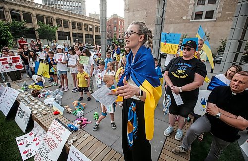 JOHN WOODS / FREE PRESS
Victoria Vasyk, who's daughter was born premature and saved in the hospital that was bombed, speaks to Ukraine supporters as they gather at the corner of portage and Notre Dame for a rally in Winnipeg Tuesday, July 9, 2024. 

Reporter: ?