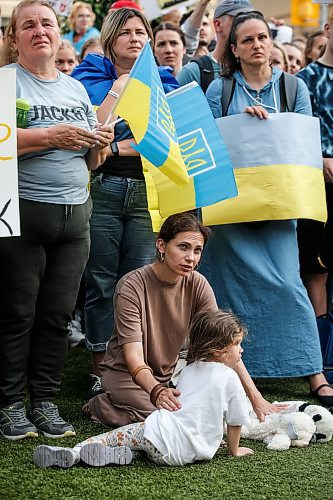 JOHN WOODS / FREE PRESS
Ukraine supporters gather at the corner of portage and Notre Dame for a rally in Winnipeg Tuesday, July 9, 2024. 

Reporter: ?