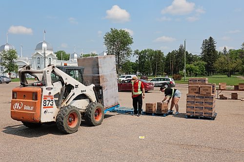 Thousands of pounds of fries and hashbrowns were brought out to the Keystone Centre on Wednesday to be distributed by volunteers from McCain Foods and Heritage Co-op for the annual Free Fry Day fundraiser for Ronald McDonald House Charities. (Colin Slark/The Brandon Sun)