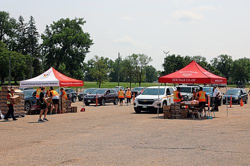 A steady stream of cars passed through the Keystone Centre's parking lot on Wednesday during McCain Foods and Heritage Co-op's annual Free Fry Day fundraiser for Ronald McDonald House charities. (Colin Slark/The Brandon Sun)