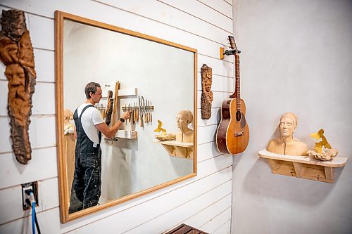 NIC ADAM / FREE PRESS
Wood carver Lucas Kost, 28, in his home-garage studio on Wednesday morning.
240710 - Wednesday, July 10, 2024.

Reporter: Dave