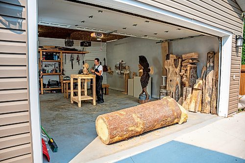 NIC ADAM / FREE PRESS
Wood carver Lucas Kost, 28, in his home-garage studio on Wednesday morning.
240710 - Wednesday, July 10, 2024.

Reporter: Dave