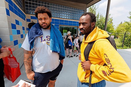 MIKE DEAL / FREE PRESS
(From left) Tyrece Viner and Samuel Hezekiah waited in line for less than 10 minutes to get into the St. Vital Outdoor Pool Wednesday afternoon.
The lineup outside the St. Vital Outdoor Pool (5 rue Des Meurons) was short and moved at a steady pace around 1:30 p.m. Wednesday.
See Tyler Searle story
240710 - Wednesday, July 10, 2024.