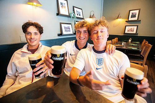 MIKAELA MACKENZIE / FREE PRESS

Soccer fans Calum McKinnon (left), Zack Street, and Fin MacKenzie watch the match between England and the Netherlands at The Grove on Wednesday, July 10, 2024. 

For Jordan story.

