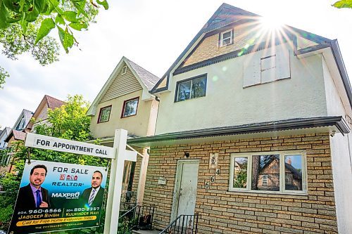 NIC ADAM / FREE PRESS
A for sale sign at 664 Toronto St. in Daniel McIntyre. Re/Max Canada has named Daniel McIntyre one of Canada&#x2019;s most liveable neighbourhoods in its 2024 Liveability Report.
240710 - Wednesday, July 10, 2024.

Reporter: ?