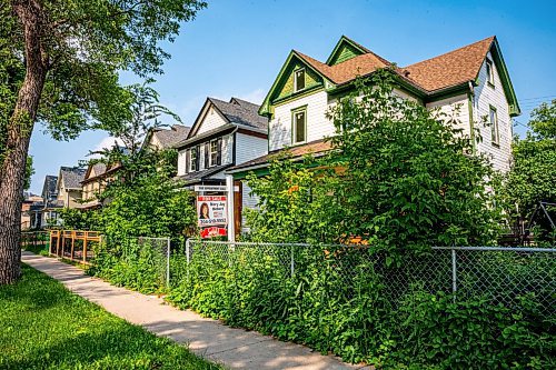 NIC ADAM / FREE PRESS
A for sale sign at 745 Toronto St. in Daniel McIntyre. Re/Max Canada has named Daniel McIntyre one of Canada&#x2019;s most liveable neighbourhoods in its 2024 Liveability Report.
240710 - Wednesday, July 10, 2024.

Reporter: ?