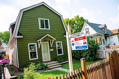 NIC ADAM / FREE PRESS
A for sale sign at 960 Lipton St. in Daniel McIntyre. Re/Max Canada has named Daniel McIntyre one of Canada&#x2019;s most liveable neighbourhoods in its 2024 Liveability Report.
240710 - Wednesday, July 10, 2024.

Reporter: ?