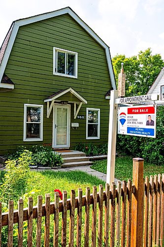 NIC ADAM / FREE PRESS
A for sale sign at 960 Lipton St. in Daniel McIntyre. Re/Max Canada has named Daniel McIntyre one of Canada&#x2019;s most liveable neighbourhoods in its 2024 Liveability Report.
240710 - Wednesday, July 10, 2024.

Reporter: ?