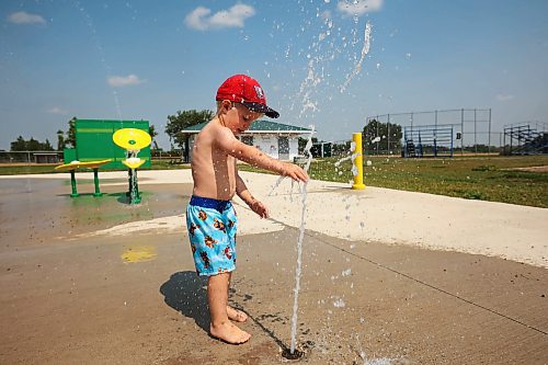 10072024
Three-year-old Kesler Davies of Cromer plays in the cool water at the Virden Spray Park on a scorching hot Wednesday afternoon. Environment Canada has forecast the heatwave to last through the weekend before daytime highs return to the mid 20&#x2019;s early next week.
(Tim Smith/The Brandon Sun)