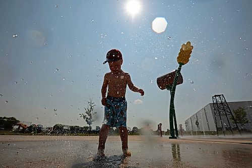 10072024
Three-year-old Kesler Davies of Cromer plays in the cool water at the Virden Spray Park on a scorching hot Wednesday afternoon. Environment Canada has forecast the heatwave to last through the weekend before daytime highs return to the mid 20&#x2019;s early next week.
(Tim Smith/The Brandon Sun)