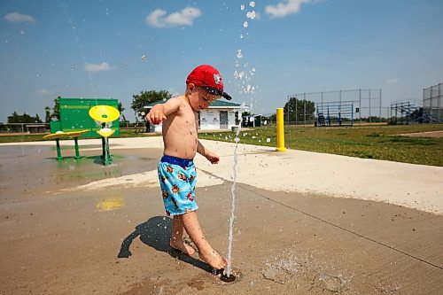 10072024
Three-year-old Kesler Davies of Cromer plays in the cool water at the Virden Spray Park on a scorching hot Wednesday afternoon. Environment Canada has forecast the heatwave to last through the weekend before daytime highs return to the mid 20&#x2019;s early next week.
(Tim Smith/The Brandon Sun)