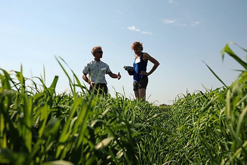 Jeff and Sheila Elder, farmers near Wawanesa, look over barley strain plots during the Centennial Celebration of the Agriculture and Agri-Food Canada’s Brandon Research and Development Centre Barley Breeding Program on Thursday. The Elders have been involved in barley variety research at their farm and Shiela is a board member for the Manitoba Crop Alliance. (Tim Smith/The Brandon Sun)