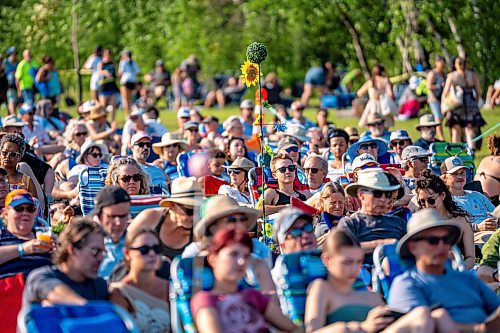 NIC ADAM / FREE PRESS
The 49th edition of the Winnipeg Folk Festival kicks off Thursday night with a music lineup that includes Lucinda Williams and Winnipeg&#x2019;s Roman Clarke.
Tarp markers poke out of the crowd at the main stage at Winnipeg Folk Festival Thursday afternoon.
240711 - Thursday, July 11, 2024.

Reporter: Eva Wasney