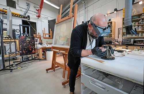 Ruth Bonneville / Free Press

ent - Behind the Scenes - Vitaliy Yatsevych

Photo of Vitaliy Yatsevych,  WAG-Qaumajuq Conservator, at the Winnipeg Art Gallery.

Vitaliy Yatsevych is WAG-Qaumajuq Conservator. His job is to care for and restore artworks to their former glory. 

He recently embarked on one of the biggest restoration projects of his career: Kim Adams Earth Wagons, which is composed of teeny tiny model train parts. 

For feature on him and his work as part of a new Arts &amp; Life series called Behind the Scenes,  Photos  of him with Earth Wagons still on display and working behind the scenes on works.  


Story by Jen Zoratti 

July 10th,  2024

