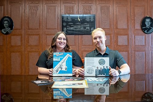 BROOK JONES / FREE PRESS
Kayla Bobrowski (left) and her brother Dylan are pictured holding old promotional material as they sit in the boardroom at Imperial Steel at 901 Century St., in Winnipeg, Man., Thursday, July 11, 2024. The brother-sister duo are junior executives and the fourth generation at Imperial Steel.