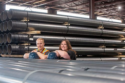 BROOK JONES / FREE PRESS
Dylan Bobrowski (left) and his sister Kayla are pictured in the warehouse which is filled Galvanized steel tubing at Imperial Steel at 901 Century St., in Winnipeg, Man., Thursday, July 11, 2024. The brother-sister duo are junior executives and the fourth generation at Imperial Steel.