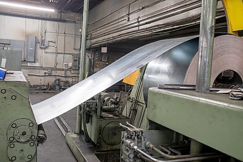 BROOK JONES / FREE PRESS
Galanized steel coil enters a milling machine, which moulds the steel into tubing at Imperial Steel at 901 Century St., in Winnipeg, Man., Thursday, July 11, 2024.