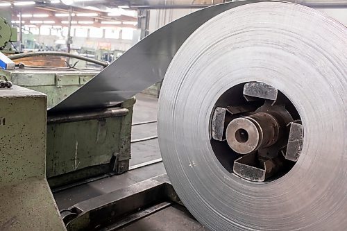 BROOK JONES / FREE PRESS
Galanized steel coil enters a milling machine, which moulds the steel into tubing at Imperial Steel at 901 Century St., in Winnipeg, Man., Thursday, July 11, 2024.