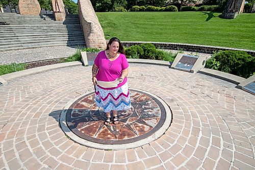 BROOK JONES / FREE PRESS
Jaime Grasby who is an indigenous story teller and knowledge keeper holds a feather fan and a smudging shell as she is pictured at the Oodena Celebration Circle at The Forks in Winnipeg, Man., Thursday, July 11, 2024.