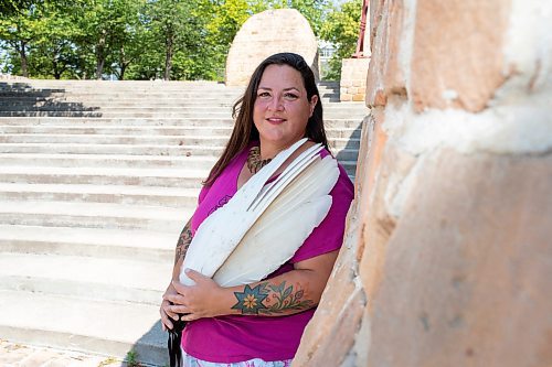 BROOK JONES / FREE PRESS
Jaime Grasby, 43, who is an indigenous story teller and knowledge keeper holds a smuding feather fans as she is pictured at the Oodena Celebration Circle at The Forks in Winnipeg, Man., Thursday, July 11, 2024.