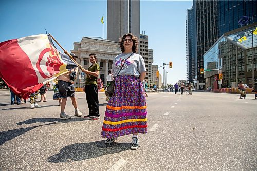 BROOK JONES / FREE PRESS
BROOK JONES / FREE PRESS
Winnipeg resident Jessica Courchene, who is from Sagkeeng First Nation, is following a round dance at the intersection of Portage Avenue and Main Street in Winnipeg, Man., on the afternoon of Thursday, July 11, 2024. The round dance was organized following the announcement that a judge ruled serial killer Jeremy Anthony Michael Skibicki is criminally responsible for slaying four indigenous women in Winnipeg in early 2022. Courchene had been Skibicki&#x2019;s neighbour. Her father was one of several neighbours who testified against Skibicki during the trial.