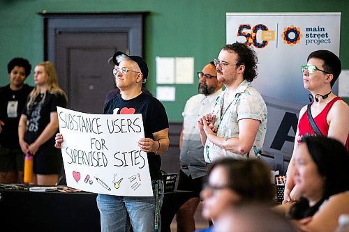 MIKAELA MACKENZIE / FREE PRESS

Jonny Mexico, with the Manitoba Harm Reduction Network, holds a sign at a safer consumption site announcement at the Aboriginal Health &amp; Wellness Centre on Friday, July 12, 2024. 

For Malak story.

