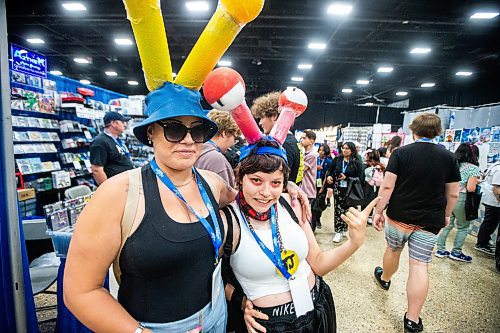 MIKAELA MACKENZIE / FREE PRESS

Melanie (left) and Cici Shewchuk attend Ai-Kon at the RBC Convention Centre on Friday, July 12, 2024. 

Standup.

