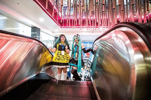 MIKAELA MACKENZIE / FREE PRESS

McKenna McLean (left) and Willow Reimer attend Ai-Kon at the RBC Convention Centre on Friday, July 12, 2024. 

Standup.

