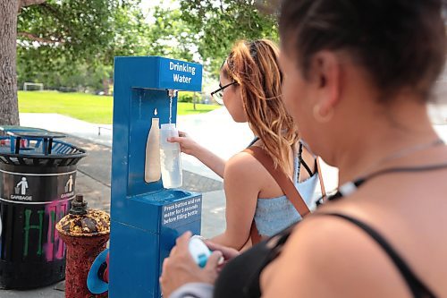 Ruth Bonneville / Free Press

Local - Hydration Stations

Madison and her mom Priscilla stop to fill up a water bottle with water at the hydration station located at 185 Young Street.  

The City of Winnipeg has hydration stations throughout the city to cool off and access clean drinking water.  

July 12th,  2024

