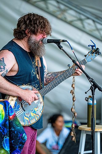 NIC ADAM / FREE PRESS
Mike Savino, known professionally as Tall Tall Trees, performs at the Spruce Hollow stage at the Winnipeg Folk Festival Friday afternoon.
240712 - Friday, July 12, 2024.

Reporter: ?