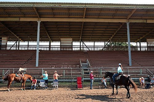 12072024
An advanced barrel racing clinic led Shannon Kerr, a horse trainer and barrel racer living in Brazil, takes place at the Austin Stampede grounds on a scorching hot Thursday.  Before arriving in Manitoba, Kerr led clinics in Saskatchewan, Alberta and BC. (Tim Smith/The Brandon Sun)