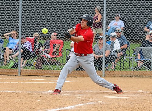 Borderline Legends hitter Darrel Sobkow (12) gets the bat on the ball during the final of the inaugural 50-plus Softball Manitoba masters championship against the Onanole Sporty&#x2019;s Originals in Onanole on Sunday afternoon. The Originals earned a hard-fought 8-7 victory. (Perry Bergson/The Brandon Sun)