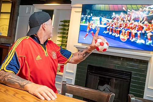 BROOK JONES / FREE PRESS
Winnipeg resident Duane Ryan, 58, who is originally from Newfoundland and Labrador, celebrates Spain's 2-1 victory over England in Euro Cup final. Ryan watched the match on TVs at the Elephant &amp; Castle in Winnipeg, Man., Sunday, July 14, 2024.