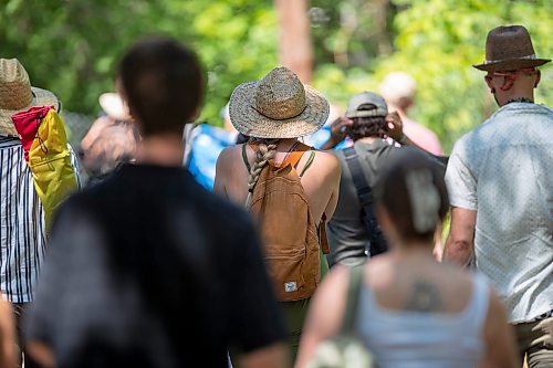 BROOK JONES / FREE PRESS
Folk Fest goers make their way to the site area of the 49th Winnipeg Folk Festival at Birds Hill Provincial Park in Man., Sunday, July 14, 2024.