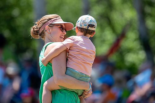 BROOK JONES / FREE PRESS
Folk Fest goer Pam Whale, 37, who is from Winnipeg, Man., dances with her son Joey Harris, two, as they dance to music by Inn Echo Tech Rider at the Snowberry Field stage at the 49th Winnipeg Folk Festival at Birds Hill Provincial Park in Man., Sunday, July 14, 2024. 