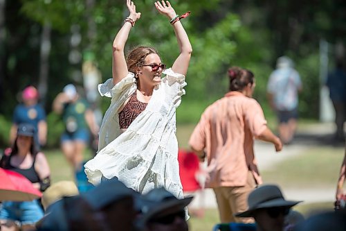 BROOK JONES / FREE PRESS
Folk Fest goer Michelle Bedford, who lives in Bemidji, Minn., dances to music by Inn Echo Tech Rider at the Snowberry Field stage at the 49th Winnipeg Folk Festival at Birds Hill Provincial Park in Man., Sunday, July 14, 2024. It was Bedford's second time attending Folk Fest.